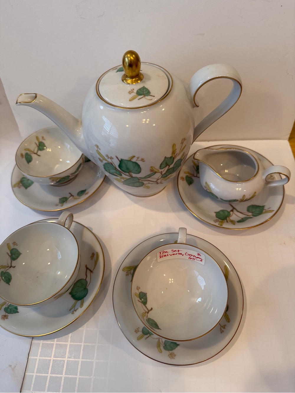 Porcelain Tea Set with Green Leaf Motif and Gold Trim - Picture 3 of 4
